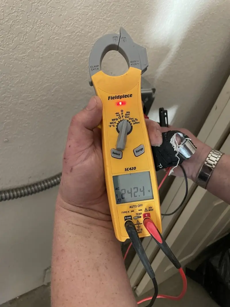 Voltage testing with clamp meter during Generator Installation in Salem